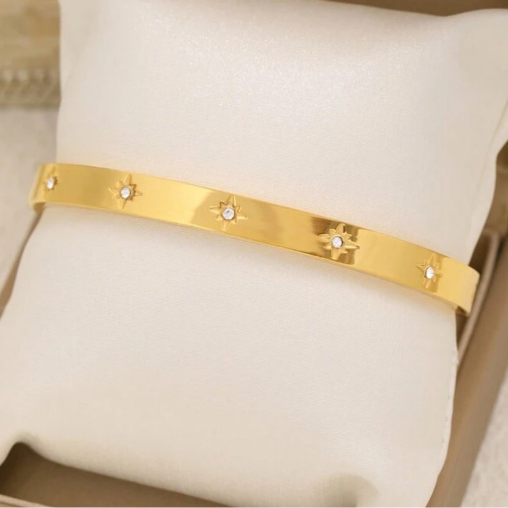 Gold plated stainless steel star bangle bracelet